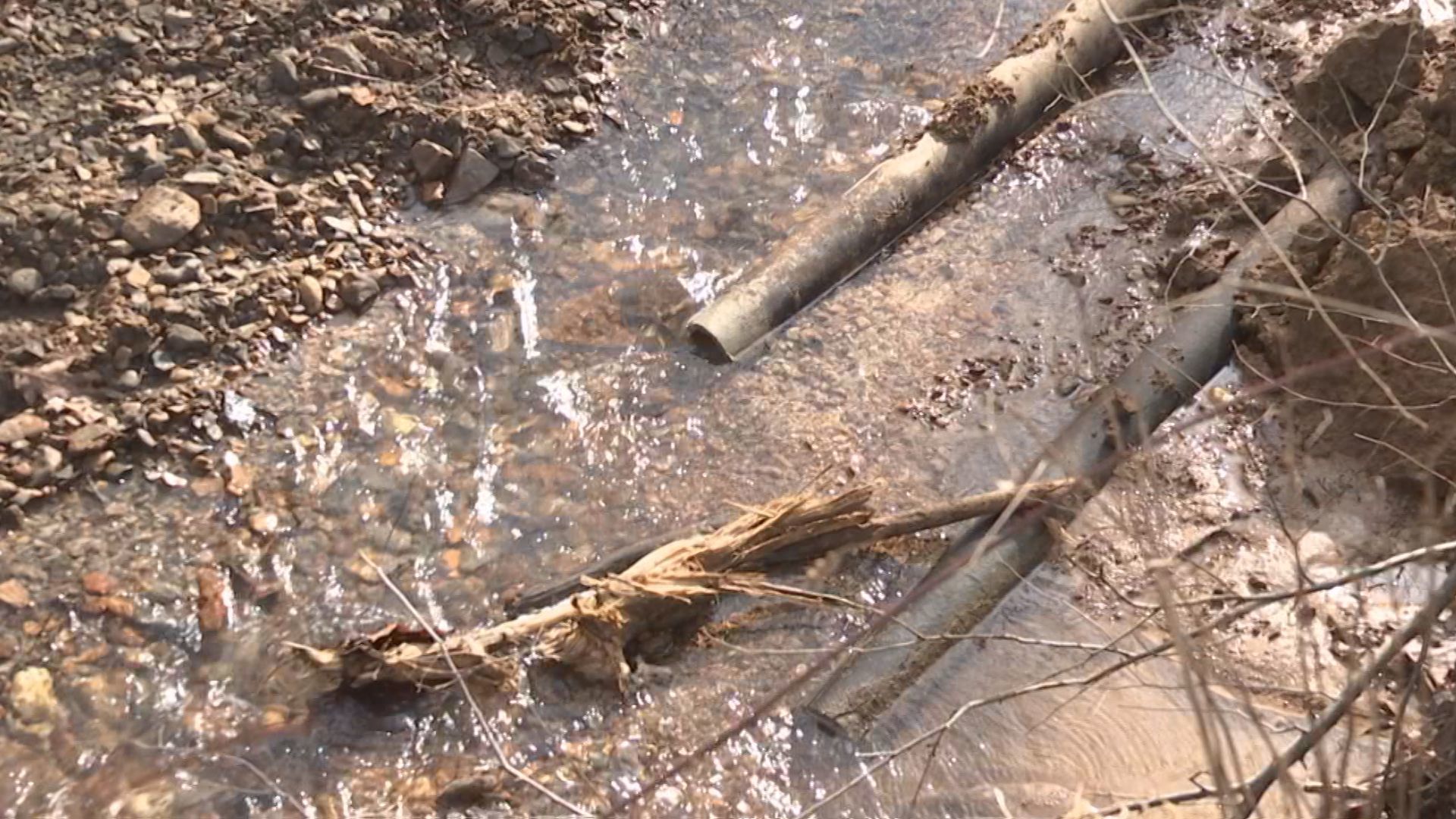 Symsonia water lines in creek